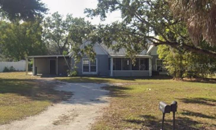 Photo of 816 W Country Club Drive, Tampa, FL 33612 (MLS # TB8546581)