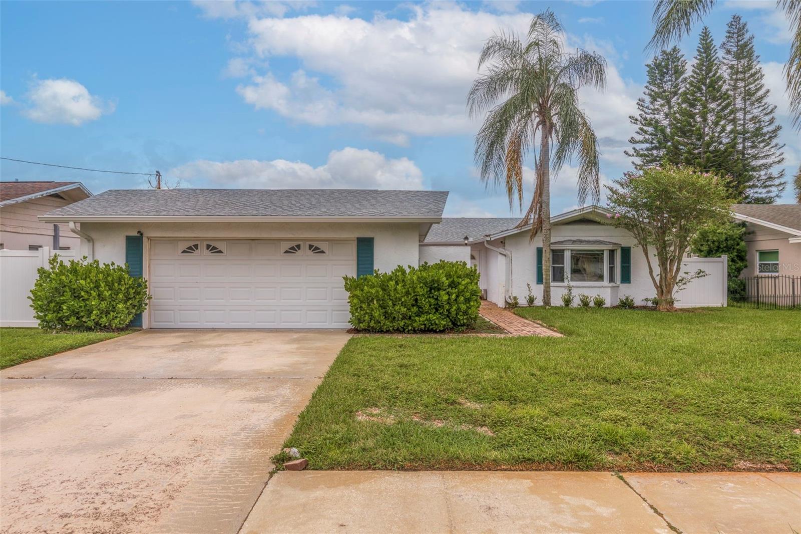 ***Boaters Paradise*** Property did have some have some minor water intrusion from Helene. This is a GREAT OPPORTUNITY for a buyer that would love to live in a Solid Block Waterfront home with lots of potential! Brand new Private Salt Water Pool (2024) and a BOAT DOCK! An exquisite waterfront retreat nestled in the Bay Crest community of Tampa. This updated home boasts an open floor plan that seamlessly blends indoor and outdoor living, perfect for those who love to entertain or simply relax in style. Through your private Courtyard entrance, Step inside to find a spacious living area filled with natural light, enhanced by clean lines and timeless design. The gourmet kitchen is a chef’s dream, featuring new Stainless Steel appliances (dishwasher does not work and is not warranted), sleek deep blue soft close cabinetry, pantry and ample Prep Space. The gorgeous adjacent Dining Room is great for dinner gatherings! Split Bedroom plan includes a very large Primary Bedroom with a Bay Window, Updated en-suite Bath and a large custom walk in closet. Two additional large bedrooms and a hall bath. The flex space off of the Kitchen can be used as a Den or an Office. You will LOVE the Gleaming Terrazzo Floors throughout. All New Light Fixtures and Ceiling Fans. New Interior Doors, 5" Baseboards & Decorative Wall Paneling. The attached oversized two-car garage has a Washer/Dryer hook ups and epoxy floor coating. The property boasts a private backyard oasis with a new pool, Screened in Lanai and a spacious (Trex) Deck, perfect for entertaining or soaking up the Florida sunshine! With 70 feet of seawall along a salt water canal, this home provides quick, direct access to Tampa Bay. This property is just minutes from shopping, dining, and all that Tampa Bay has to offer including pristine Beaches, Festivals, Entertainment, Tampa Bay Sports and the Award winning Tampa International Airport! Don’t miss your chance and opportunity to own this stunning block home in one of Tampa’s premier waterfront neighborhoods at a GREAT PRICE!