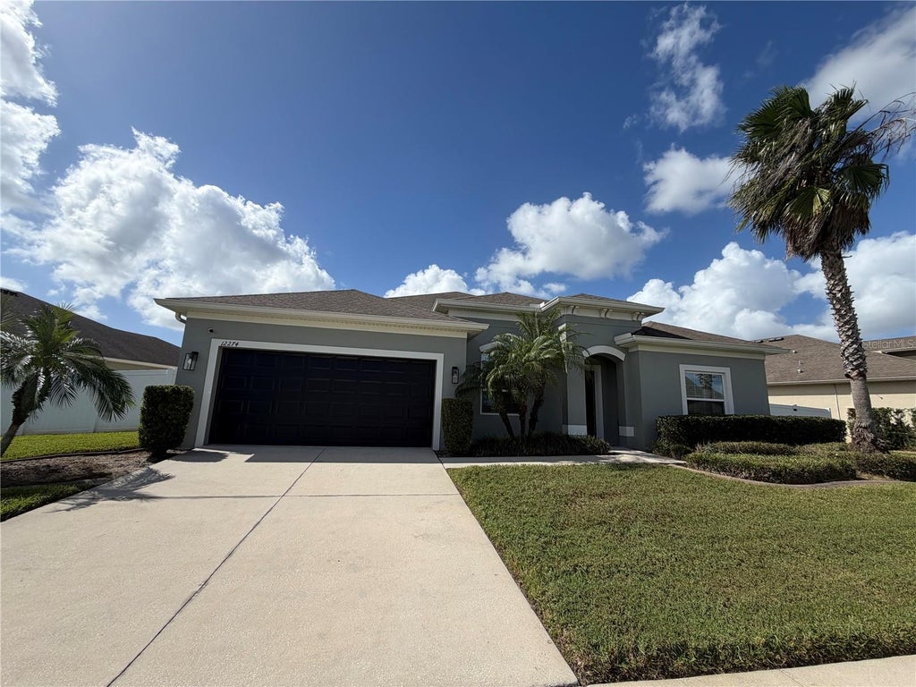 Photo of 12274 Sabal Palmetto Place, Orlando, FL 32824 (MLS # O6453022)