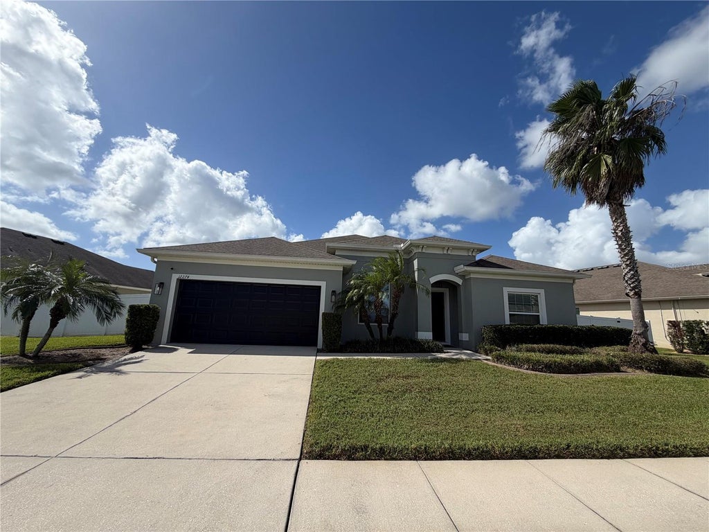 Photo of 12274 Sabal Palmetto Place, Orlando, FL 32824 (MLS # O6453022)