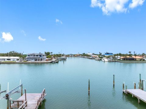 Photo of 440 115th Avenue, Treasure Island, FL 33706 (MLS # TB8383431)