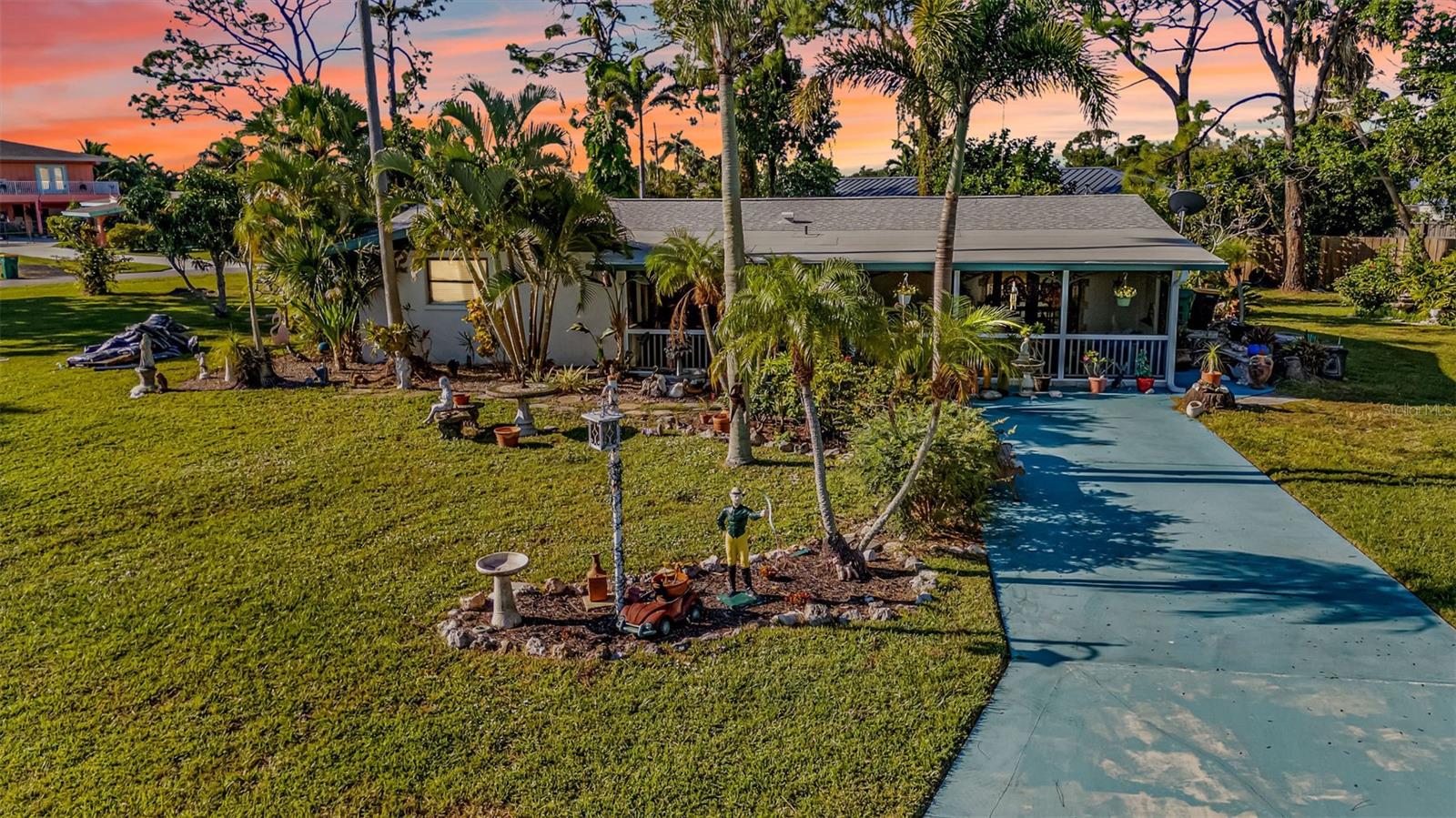 Welcome home to this charming 2-bedroom, 2-bath residence with a versatile bonus room, perfectly situated in the heart of Grove City. Enjoy the best of coastal living just minutes from Englewood’s beautiful beaches, local restaurants, lively tiki bars, and boutique shopping.
Set on a spacious corner lot, this property offers plenty of room to design your own tropical retreat—add a pool, garden, or extra outdoor entertaining space. Two storage sheds provide ample room for tools, beach gear, or hobbies.
Start your mornings on the inviting front porch, where you can sip your coffee and listen to the gentle sounds of birds greeting the day. Inside, you’ll find a bright and airy Florida room, perfect for a family gathering space, hobby area, or second living room.
Recent updates, including a new roof (2023) and newer AC, ensure peace of mind and comfort year-round. With no HOA restrictions and plenty of parking for a boat or trailer, this home is ideal for anyone looking to fully embrace the laid-back Florida lifestyle.
Whether you’re searching for a primary residence, vacation getaway, or investment opportunity, this Grove City gem offers a perfect blend of charm, flexibility, and location—all waiting for you to make it your own!