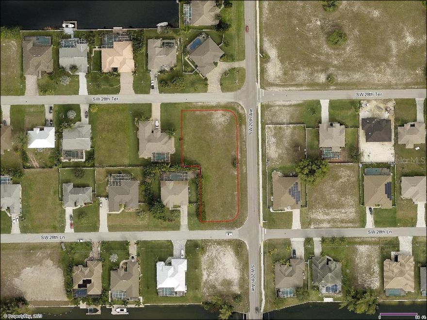 Vacant, oversized, corner lot located in an established residential neighborhood is now available at 2000 SW 28th Terrace. Lot size is almost 2/3's of an acre, is cleared and ready for your custom designs. Ideal location just South of Veterans Memorial Parkway. Close proximity to the Pine Island Corridor with an abundance of restaurants, shopping, and entertainment venues.  The beautiful beaches of Ft. Myers, Sanibel, Matlacha and Pine Island are nearby.  Take a drive by today! Seller requires their custom contract and terms. Call or text for information.