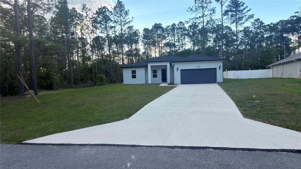 Photo of 7250 N Freeport Circle, Citrus Springs, FL 34434 (MLS # O6404373)
