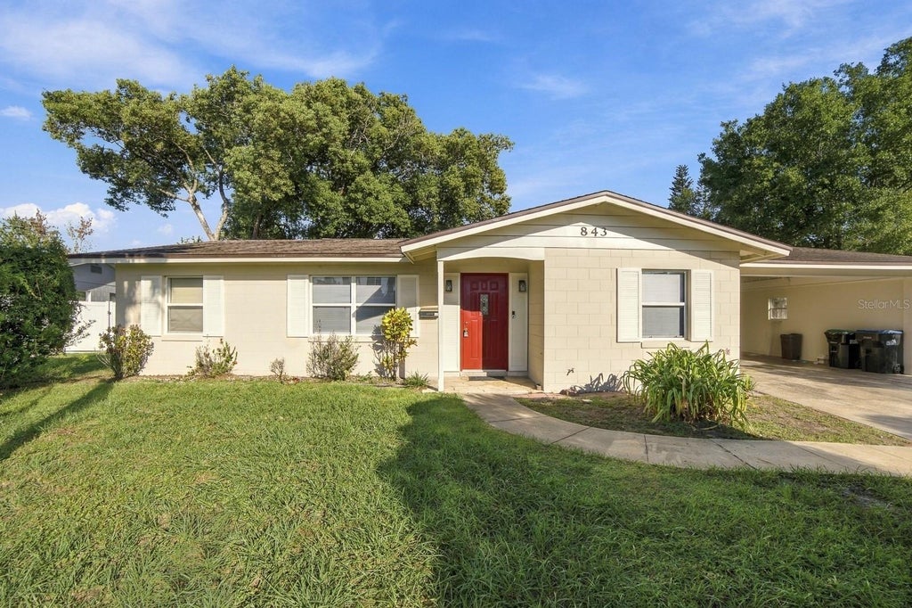 Photo of 843 Quintilian Avenue, Orlando, FL 32809 (MLS # O6447593)