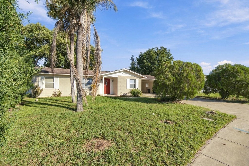 Photo of 843 Quintilian Avenue, Orlando, FL 32809 (MLS # O6447593)