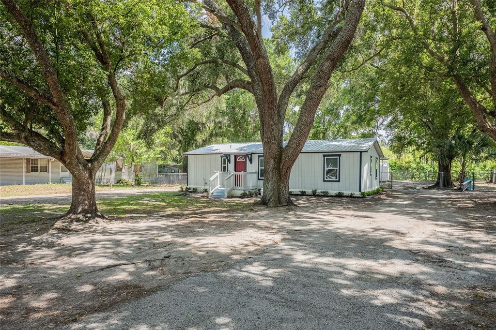 Photo of 5220 Spring Creek Dr, Lakeland, FL 33811 (MLS # L4962001)