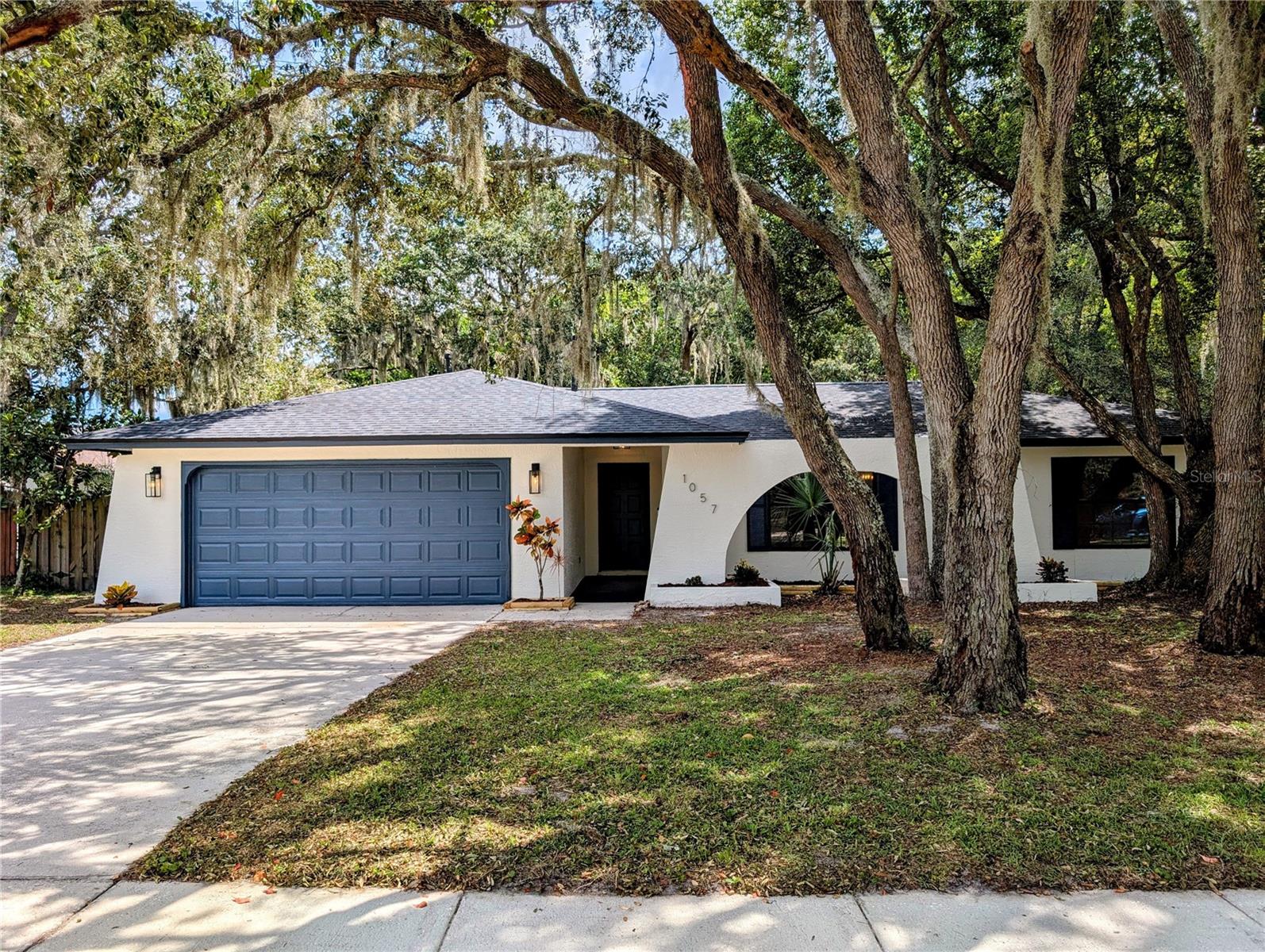 One or more photo(s) has been virtually staged. Don’t miss your chance to own this beautifully renovated 3-Bed, 2-Bath home in the heart of Casselberry. With 1,775 sq ft of living space and no rear neighbors, this property offers both privacy and modern comfort.
Every major update has been taken care of in 2025 — including a brand-new roof, HVAC, water heater, and complete replumb. Inside, you’ll find continuous luxury vinyl plank flooring, granite countertops, soft-close cabinetry, updated fixtures and lighting, and fresh paint inside and out. A screened-in porch overlooks the private backyard, perfect for relaxing evenings or weekend gatherings.
Conveniently located near top-rated schools, shopping, dining, and major highways, this move-in ready home blends quality updates with everyday convenience. Schedule your showing today and see why 1057 Nodding Pines Way is the perfect place to call home!