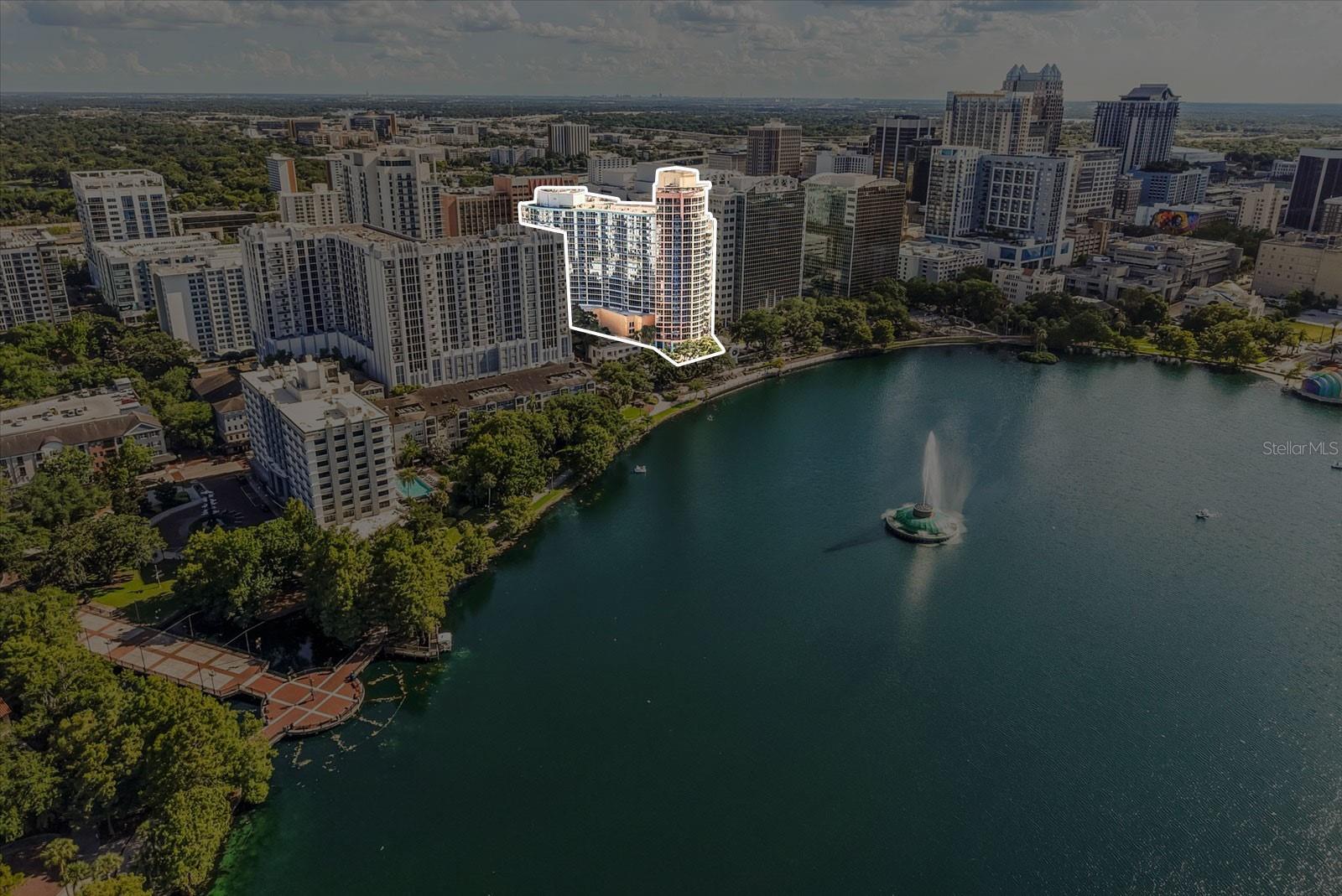 For lease, available now. Located in the Waverly Condo, directly across the street from Lake Eola in the heart of downtown Orlando. This thoughtfully updated two-bedroom, two-bath home offers effortless city living. An open-concept living area welcomes you with warm laminate flooring and ample natural light. Open the glass doors to your private balcony, where you’ll enjoy morning coffee or evening unwinds with views of the resort-style pool below and the shimmering lake beyond.
The kitchen strikes a perfect balance between form and function, featuring stainless-steel appliances, quartz countertops, a clean subway-tile backsplash, and plenty of cabinet space for everyday cooking. The second bedroom adapts seamlessly to your lifestyle—guest room, home office, or hobby space—and the adjacent bathroom has been refreshed with modern fixtures for everyday ease.
The primary bedroom is a retreat complete with a spacious walk-in closet and an en-suite bathroom. Here you’ll find a deep soaking tub, large-format tile underfoot, and a granite-topped vanity that adds a polished touch. Beyond your door, you’ll enjoy one assigned parking spot, concierge service, a fitness center, and that inviting pool deck.
Just steps from your door you’ll find Publix for everyday essentials, Foxtail Coffee Co. for your morning pick-me-up (along with other nearby cafés), and an eclectic mix of boutiques, lounges, and restaurants—from casual grab-and-go bites to stylish evening spots. With all of that right at your fingertips, downtown energy and convenience truly come together here. Reach out today to schedule your personal tour.