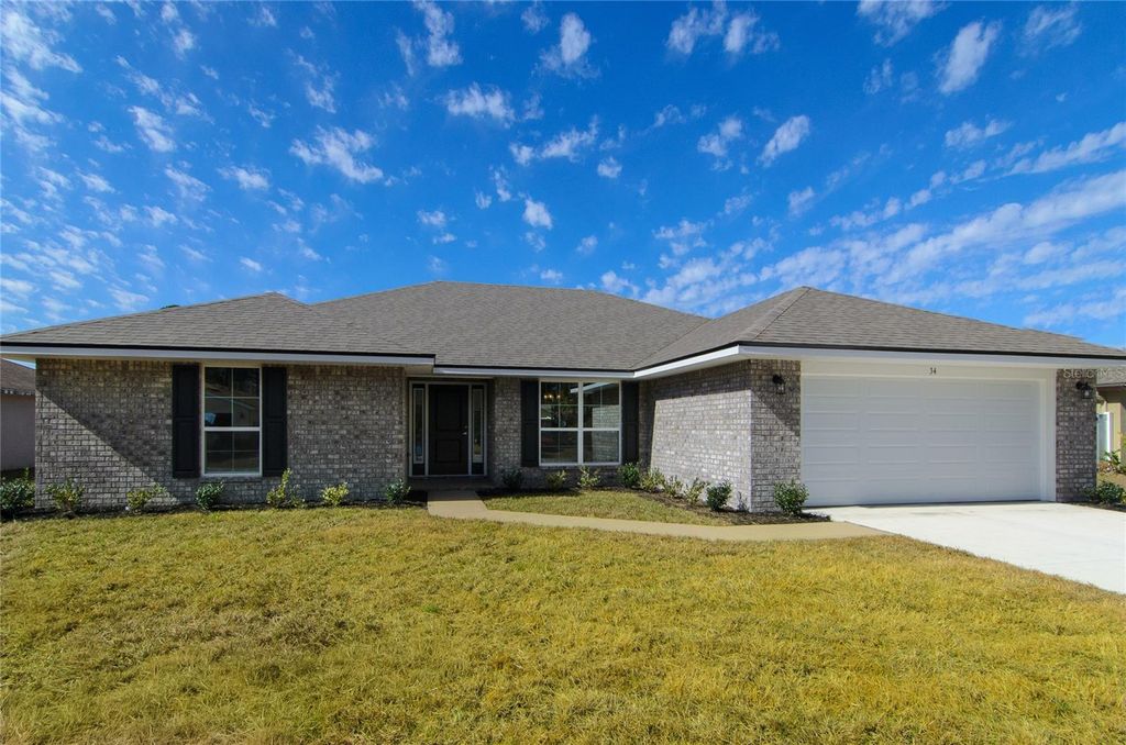 Photo of 8 Louvet Lane, Palm Coast, FL 32137 (MLS # FC315540)