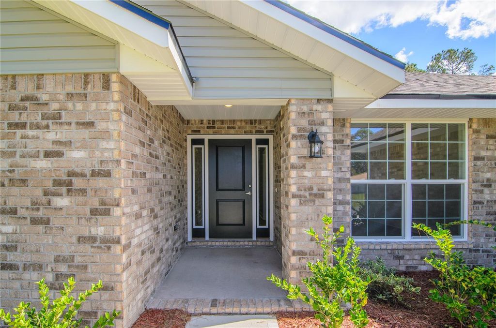 Photo of 8 Louvet Lane, Palm Coast, FL 32137 (MLS # FC315540)