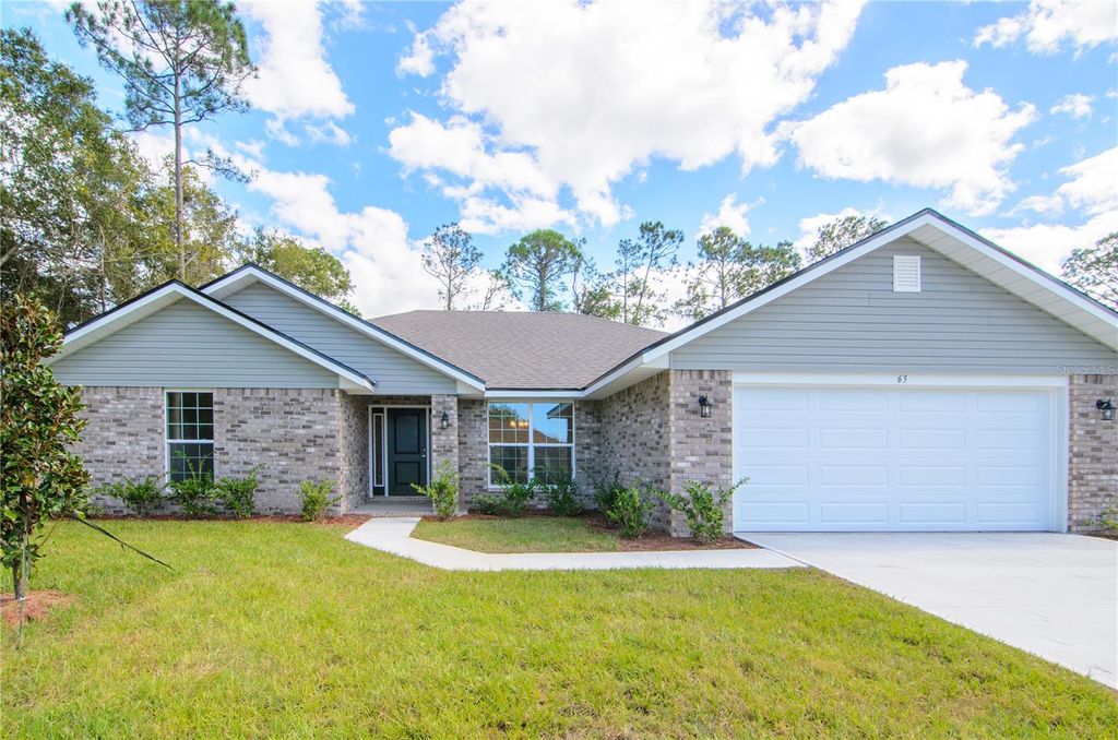 Photo of 8 Louvet Lane, Palm Coast, FL 32137 (MLS # FC315540)