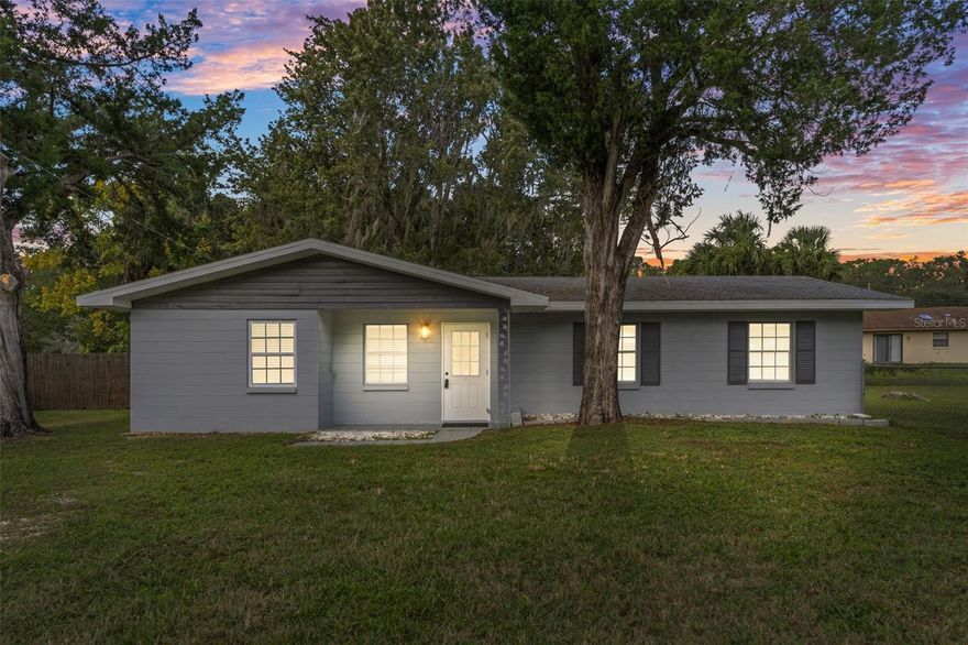 Welcome to 10785 West Spring Circle! Perfectly situated in the vibrant coastal town of Crystal River known for its natural springs, gentle manatees, and relaxed waterfront lifestyle. This beautifully remodeled 3-bedroom, 2-bath home sits on a spacious .30-acre fenced lot featuring a charming front porch and offering plenty of room for outdoor enjoyment! Step inside to find an inviting spacious living room and a separate dining area perfect for gatherings and entertaining. The updated kitchen shines with granite countertops, new cabinetry, new stainless-steel appliances, and modern lighting throughout. The primary suite features an updated private bath with a walk-in-tiled shower while the two additional bedrooms share an updated guest bath with a tub. Enjoy new luxury vinyl plank flooring throughout, new 5 ¾” baseboards, a newer double-pane sliding glass door, ceiling fans, and a new hot water heater (2024). The A/C was also replaced in 2024, ensuring comfort and efficiency. An inside laundry room and a 10x20 bonus flex room with ceramic tile and decorative built-in shelving provide plenty of extra living and storage space. Outside, the large, fenced yard includes a shed and ample space for outdoor fun, pets, or future pool plans. Located in a desirable community with access to a boat ramp through Crystal River Watersports where for a nominal daily or yearly fee, you’ll enjoy endless opportunities for boating, fishing, kayaking, and soaking up the true Crystal River lifestyle. Residents can also take advantage of optional manatee tours, snorkeling, scuba diving, sunset cruises, and boat rentals making it easy to enjoy Florida’s Gulf Coast adventures right from your doorstep! Conveniently located close to everything including schools, shopping, dining, medical facilities, boating, fishing, attractions, airports, and Florida's famous beaches. Easy access for commuting to Tampa and Orlando. This home combines comfort, convenience, coastal charm, and is truly move-in ready and waiting for its next owner to enjoy the Florida lifestyle!