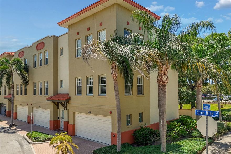 Location, lifestyle, and space—all in the heart of downtown Clearwater just minutes from world-famous Clearwater Beach. This furnished 2008-built end-unit townhome sits in a quiet, tucked-away community just one block east of Ft. Harrison Blvd. You’re minutes to restaurants, grocery stores, the Pinellas Trail, and Clearwater’s new waterfront amphitheater—everything you need right at your doorstep. Inside, the home offers a bright, open second floor with a kitchen/dining combo, half bath, and a living room filled with natural light from oversized windows. The third floor features a spacious primary suite with walk-in closet and en-suite bath, plus a second bedroom with its own private bath—perfect for guests. Laundry is conveniently located between both bedrooms. The 2-car garage includes two storage rooms, one of which is climate-controlled and ideal for a home office or flex space. As a rare larger end unit—one of only four in the community—you also get an extended driveway for guest parking, a private rear paver patio, and access to additional community parking. A rare opportunity for low-maintenance living in one of Clearwater’s most walkable and desirable locations. Schedule your showing today.