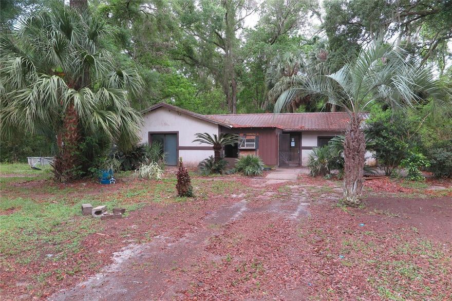 Located just off a paved road, this 5 acre property with 1584 SQ FT of living space, offers an open living room, dinning and big primary bathroom including laundry facilities.  Also featured is the concrete barn/workshop or RV storage.  Don’t miss the opportunity to take a look at this property.