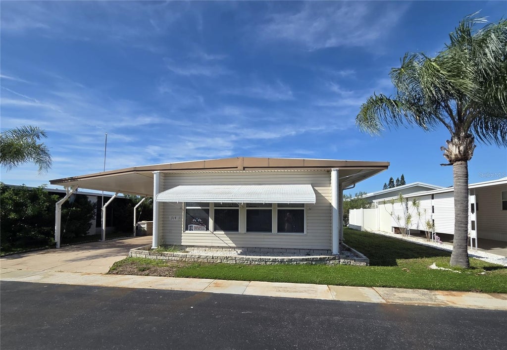Photo of 3301 Palm Harbor Boulevard #314, Palm Harbor, FL 34683 (MLS # TB8553076)