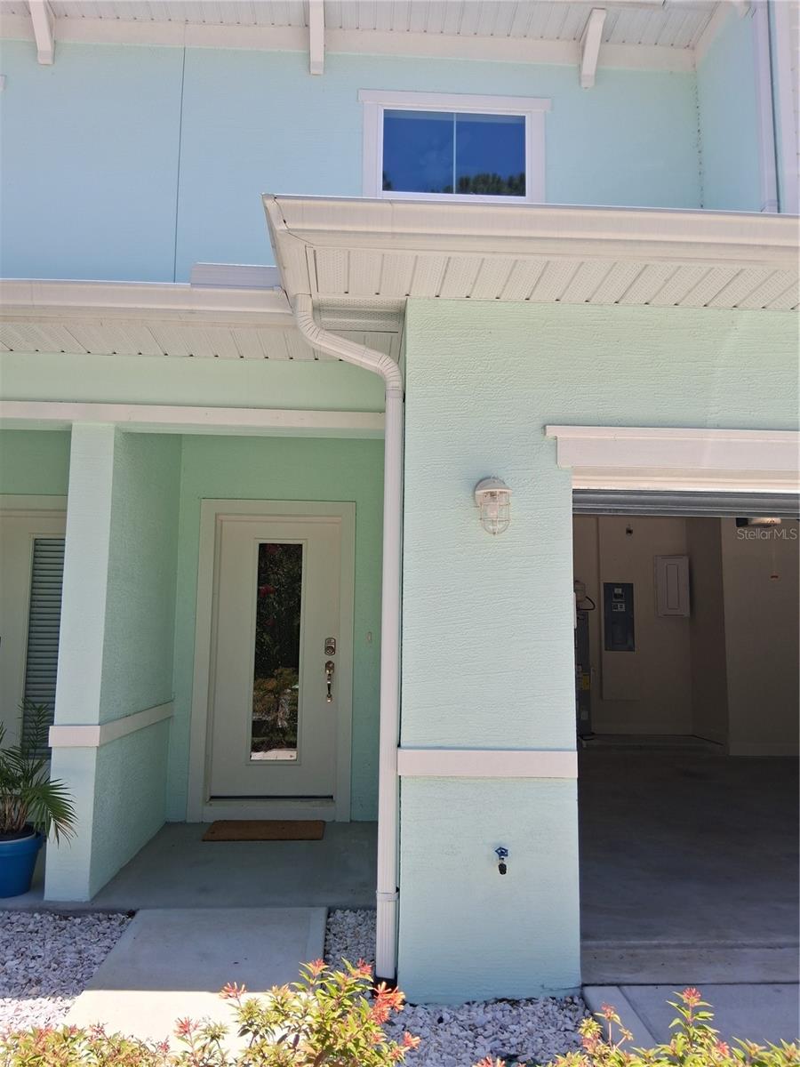 Exceptional price on this 3 bedroom 2.5 bath townhouse end unit. Brand new. Never lived in, Used as a model.LARGE BACK YARD ALLOWS A POOL Natural preserve behind the house. 9.4" ceilings on 1st and 2nd floors. Laundry on 2nd floor. Oversized garage with storage closet. This is a smart house. Hurricane resistant windows. Half mile to shopping center. one tenth of a mile to the post office and 3.5 miles to the white sandy beaches. Very few brand new structures available this close to the ocean at this price.
