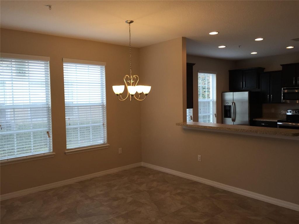 Photo of 10229 Lake District Lane #20, Orlando, FL 32832 (MLS # O6351132)
