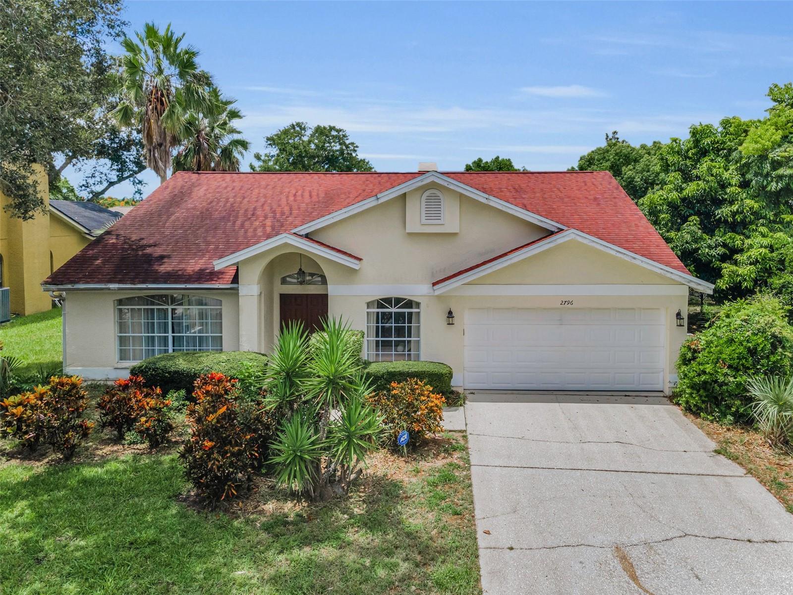 Welcome to a one owner 4-bedroom, 2-bathroom pool home located in the highly desirable Waterford Crossing community of Palm Harbor. This spacious 2,248 square foot residence features cathedral ceilings, tile flooring throughout the main living areas, and carpeted bedrooms for added comfort. Plenty of natural light throughout.
The kitchen offers a cozy breakfast nook with views of the backyard and pool, perfect for casual dining. The primary suite includes a walk-in closet and a private an en-suite bathroom, offering a relaxing retreat at the end of the day. An interior laundry room adds to the home's practicality, while a wood-burning fireplace adds warmth and charm to the main living space.
Step outside to your private screened-in pool and covered patio, ideal for relaxing or entertaining. The backyard offers both space and privacy.
Located just minutes from downtown Dunedin, Honeymoon Island, the Pinellas Trail, Dunedin Causeway, and top-rated schools, this home offers both convenience and tranquility. Whether you're relaxing in the private backyard, cooking or enjoying the spacious primary suite, this home is truly a Palm Harbor gem. Don't miss this opportunity to enjoy Florida living at its best. Love where you live!