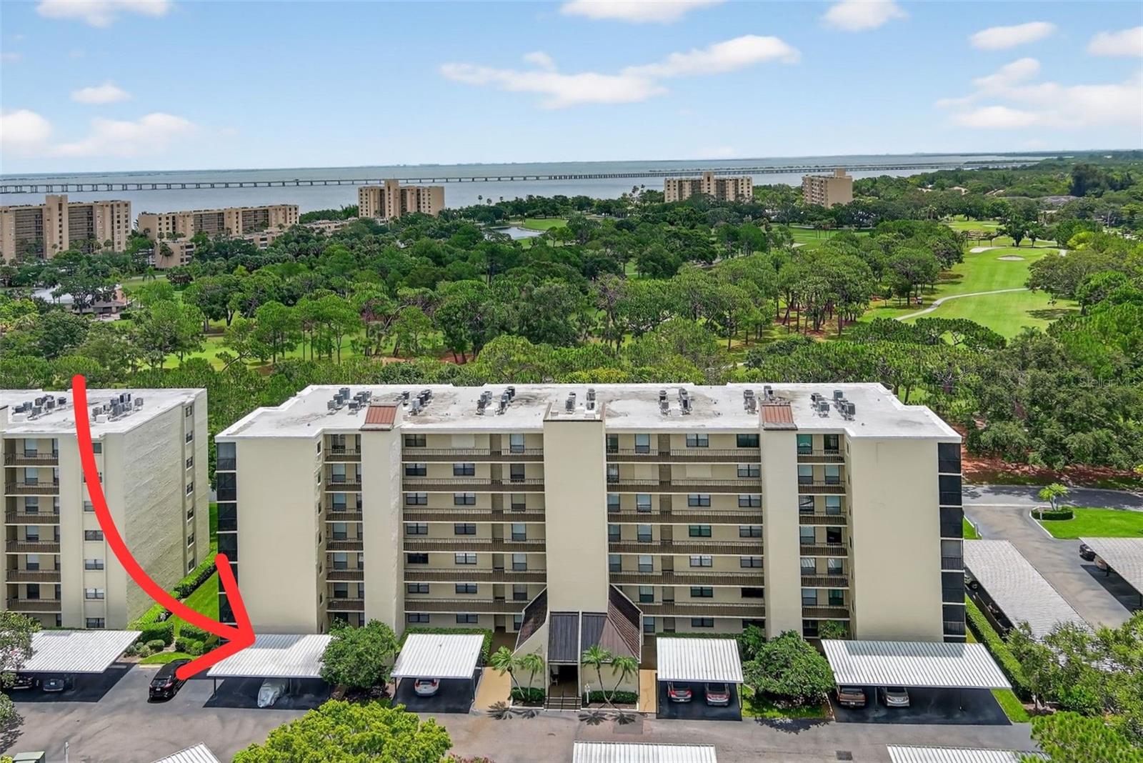 Welcome to this rare and spacious 3-bedroom, 2-bathroom ground-floor end unit in the highly desirable gated golf community of Cove Cay Village in Clearwater. Offering the feel of a single-family home, this condo features a welcoming foyer entry that leads into a generous living and dining room combination, complete with built-in shelving and an abundance of natural light from multiple sets of sliding glass doors. The bright and functional kitchen includes ample cabinetry for storage, a separate pantry for added organization, and a clean layout perfect for everyday living or entertaining. Just off the living area, you'll find one of two screened-in patios - ideal for relaxing while taking in the expansive golf course views and a peek of Tampa Bay waters. The large primary suite overlooks the golf course for a peaceful retreat with its own access to the second screened-in patio, a walk-in closet, and a unique layout that includes a separate vanity area outside the en-suite bath, along with an additional vanity inside, plus a shower/tub combination. Two additional nicely sized bedrooms share a full bathroom, offering flexibility for guests, family, or a home office. The laundry room is located conveniently on the patio. Cove Cay Village offers resort-style amenities including a 24-hour guard gate, a heated community pool and spa, clubhouse, cable TV, high-speed internet, and water. Residents also enjoy a public 18-hole golf course, a privately owned on-site marina with boat, kayak, and jet ski rentals that lead directly into Tampa Bay, two on-site restaurants that overlook the sparkling water, and a boat storage facility. This condo is perfectly situated just minutes from the Courtney Campbell Causeway to Tampa and US-19 to St. Petersburg, with easy access to the Gulf beaches and a wide variety of nearby dining and shopping options. With a new water heater installed in 2023, this beautifully maintained condo is a rare opportunity - don’t miss your chance to enjoy the Florida lifestyle at its best in Cove Cay Village.