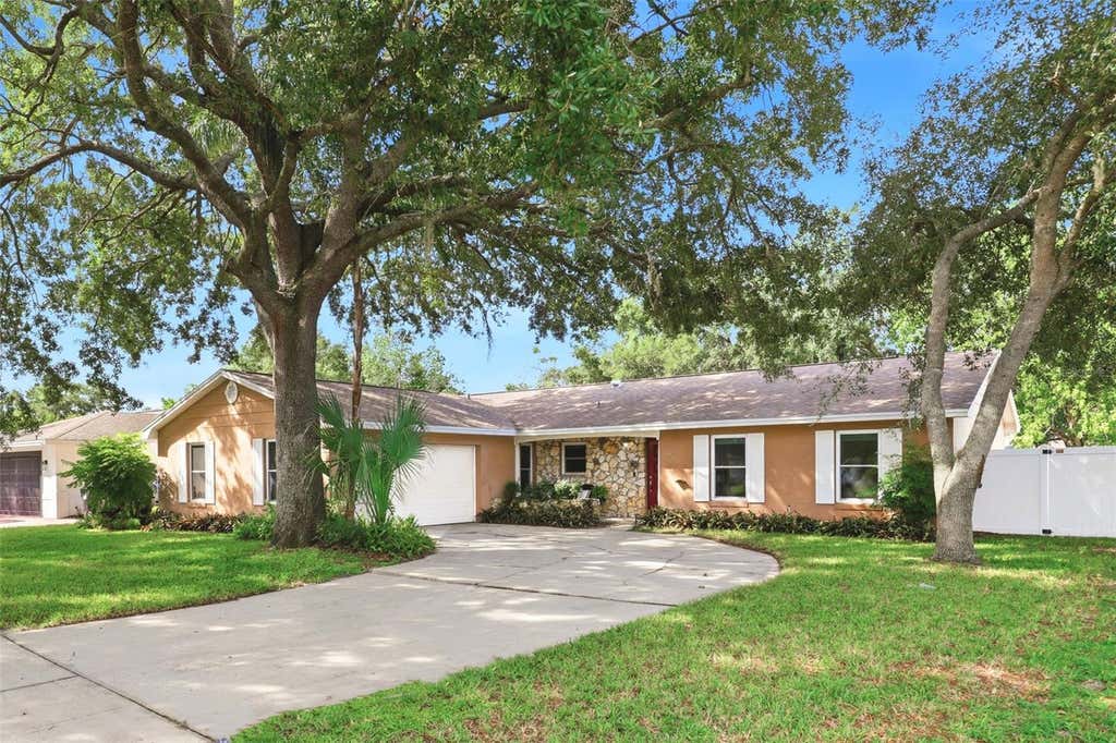 Photo of 8614 Sandberry Blvd, Orlando, FL 32819 (MLS # O6428326)