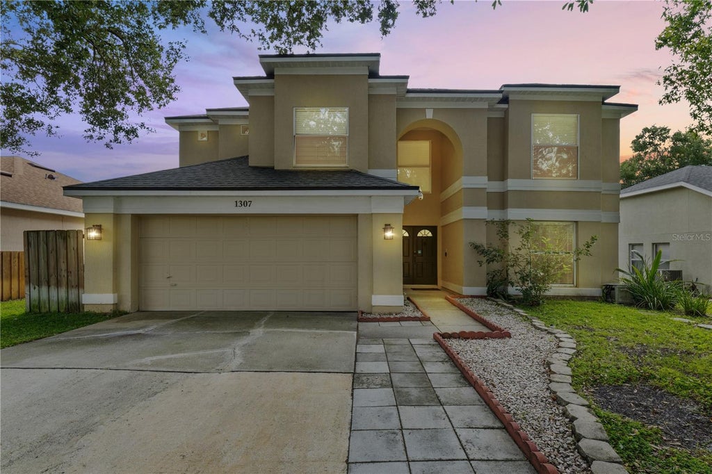 Photo of 1307 Lochbreeze Way, Orlando, FL 32828 (MLS # O6443468)