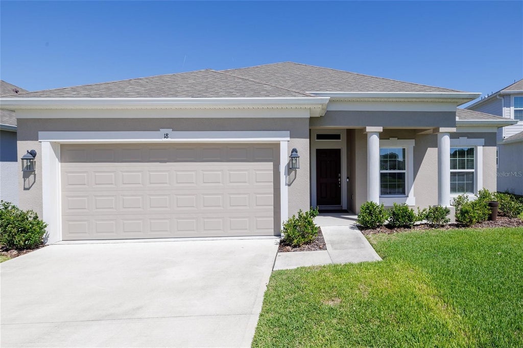 Photo of 18 Oakleaf Way, Palm Coast, FL 32137 (MLS # FC321323)