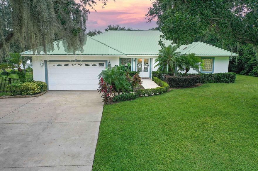 THIS "MUST-SEE" PROPERTY IS LAKEFRONT LIVING AT ITS "FINEST" WITH 191 FT FRONTAGE ON SEA PLANE FRIENDLY LAKE REEDY!!! Watch gorgeous sunsets from your DOCK and spectacular sunrises from the mature landscaped front yard! This beautiful, spacious and well maintained 3 BEDROOM/3 BATH HOME has a list of desired features starting with a SPLIT BEDROOM PLAN, 10 foot ceilings with decorative Crown Molding throughout, owned Water Treatment System, as well as a METAL ROOf. As you step inside the front door, you see the FORMAL LIVING ROOM AND formal DINING ROOM, you will immediately be captivated by the sweeping views of Lake Reedy through French Door access to the Screened Lanai and Pool Area allowing for easy entertaining!  NEXT, you will see a HOME OFFICE that could easily be converted into a potential 4th BEDROOM. Located off the Formal Dining Room, the PRIMARY BEDROOM SUITE has compelling Lake Reedy views through French Door access to the Screened Lanai and POOL, a decorative tray ceiling, and 2 huge Walk-In-Closets! The EN-SUITE BATH has split vanities, separate shower, JACUZZI tub, & separate water closet.  From the Formal Dining Room, you see the Open and Spacious KITCHEN with solid wood cabinets, pantry, Corian countertops and stainless-steel Appliances that include GE Microwave, Whirlpool Side by Side Refrigerator, GE Dishwasher as well as the 2025 Whirpool Range with Oven. For everyday dining, you have a choice of either the breakfast nook or a counter breakfast bar that separates the Kitchen from the Large FAMILY ROOM with a tray ceiling. The FAMILY ROOM has fantastic views of LAKE REEDY as well as a French door to access the Screened Lanai and POOL area. The 2nd & 3rd BEDROOMS (spacious closets) and GUEST BATH (tub/shower combo, double vanity, linen closet) are located just off the Family Room. From the Family Room, you can access the 42x25 COVERED & SCREENED LANAI & POOL area. The 3rd FULL BATHROOM is located just off the Lanai making clean up from the lake or pool convenient! The 23x19 open patio is great for grilling and entertaining with stunning views of LAKE REEDY! The 100 Ft+ Dock with 10x24 Ft platform is great for the fishermen, boaters, & viewing the sunsets! Located near the Fishing Dock is a 16Wx36Lx16H POLE BARN on a concrete pad that will accommodate your motor home! Returning to the home, between the Kitchen & Garage is a laundry room completed with a washer, dryer & pull-out storage cabinets. In the 23x25 OVERSIZED GARAGE there is plenty of room for 2 vehicles, 2021 hot water heater, owned water treatment system, second AC unit, 200 Amp service box & Generator Hook-Up!  The side-man door opens to the Fenced DOG RUN!  The Well had a new pressure tank & switch installed in 2024. There are many fishing lakes & golf courses within minutes away!  YOU ARE CONVENIENTLY LOCATED IN CENTRAL FLORIDA with easy driving to East & West Coast Beaches, Orland & Tampa International Airports, major attractions such as Disney theme parks, museums, as well as nearby River Ranch Resort & Waterpark, Bok Tower Gardens & Legoland!  A "MUST SEE" LAKEFRONT HOME!  CALL TODAY!