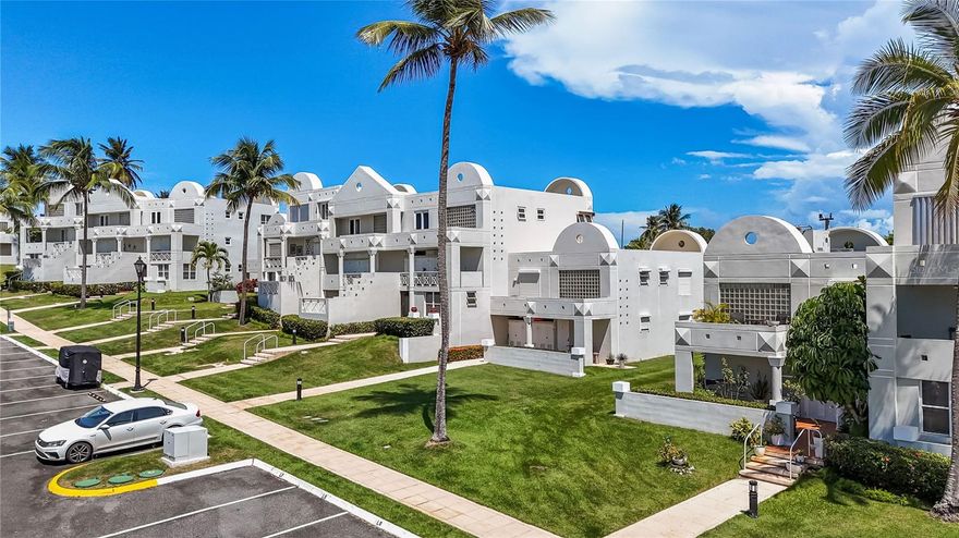 Welcome to your private sanctuary where Caribbean luxury meets resort living in one of Dorado's most coveted addresses. This completely renovated three-bedroom, two-and-a-half-bath end-unit condo represents the pinnacle of island sophistication, where every detail has been meticulously curated to deliver an uncompromising lifestyle of elegance and ease.
Step inside this two-story masterpiece and immediately sense the difference. This isn't just another renovation—this is a complete transformation executed with no expense spared. From the moment you cross the threshold, premium finishes surround you: exquisite flooring that flows seamlessly throughout, custom cabinetry crafted to perfection, designer countertops that make a statement, top-of-the-line appliances that blend beauty with performance, and impact windows that frame your paradise views while providing peace of mind. Every surface, every fixture, every finish reflects uncompromising quality.
The heart of this home is its spectacular open floor plan, designed for the way you want to live. Natural light pours through expansive windows, illuminating spaces that flow effortlessly from entertaining areas to intimate retreats. Your private patio becomes your personal oasis—imagine savoring the gentle Caribbean breeze while overlooking the pristine golf course, the perfect backdrop for morning meditation or evening cocktails. Start your day on the front terrace with freshly brewed coffee, planning your paradise agenda. Ascend to the primary suite where a generous balcony reveals breathtaking mountain vistas, your private perch for watching sunsets paint the peaks. The top guest bedroom offers an unexpected treasure: captivating ocean views that remind you daily why you chose island living.
But the true luxury here extends far beyond your front door. Your home sits within the prestigious Embassy Suites Resort community, where world-class amenities create an everyday vacation lifestyle. You're mere footsteps from sugar-sand beaches where palm trees sway in the tropical breeze and waves crash rhythmically against ancient rocks. When you're not enjoying your private residence, explore three distinct on-site restaurants, perfect your swing at the golf course or driving range, compete on pickleball courts, bowl a few frames, try your luck at the casino, challenge friends to billiards, or experience the thrill of the indoor go-kart track. This is resort living without the resort fees—it's simply home.
The practical luxuries matter too. A backup generator ensures uninterrupted comfort regardless of weather, while the water cistern provides invaluable peace of mind—essential infrastructure that savvy Caribbean residents appreciate. As a coveted first-floor end unit backing to the golf course, this property offers both convenience and prime positioning.
Location completes this exceptional offering. Nestled within an exclusive private gated community, you'll enjoy security, serenity, and the soothing tranquility that defines authentic Caribbean living. Yet you're never isolated—the charming town of Dorado, with its rich cultural tapestry, acclaimed restaurants, and convenient shopping, sits just minutes away.
This is more than a property; it's a lifestyle transformation. It's waking to ocean breezes and mountain views. It's walking to dinner or the beach on impulse. It's living where others vacation, in a home where quality meets convenience, luxury embraces livability.
