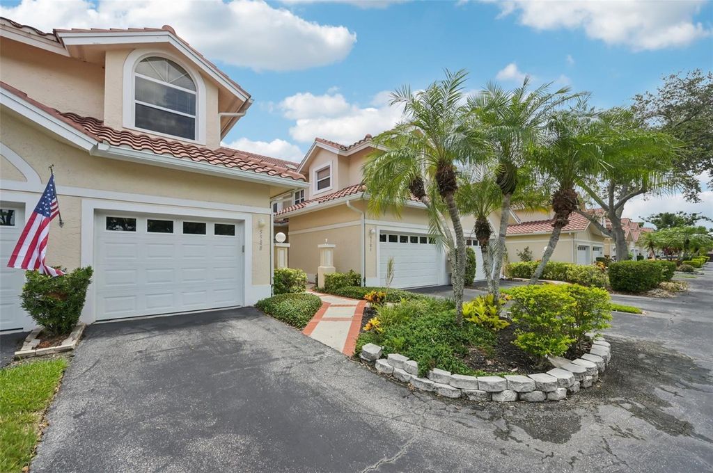 Photo of 5588 Golf Pointe Drive #1, Sarasota, FL 34243 (MLS # A4672310)