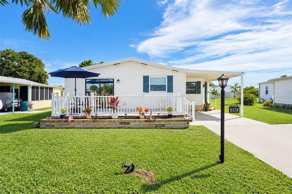 Photo of 6174 Redwing Avenue, Englewood, FL 34224 (MLS # D6148818)