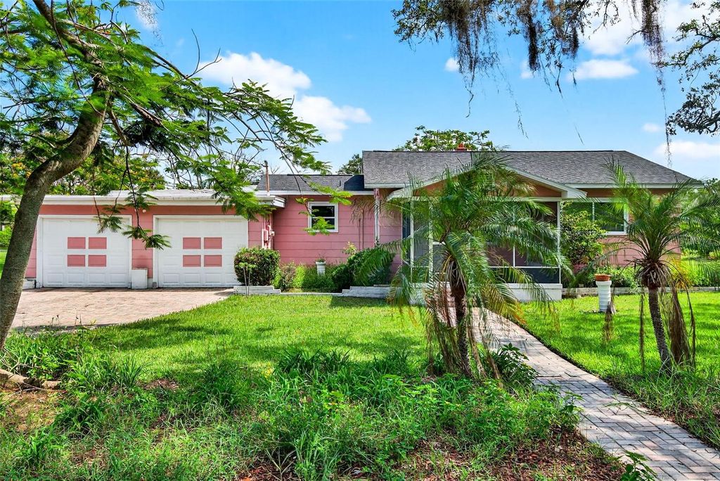 Photo of 614 Riverside Drive, Tarpon Springs, FL 34689 (MLS # W7877124)