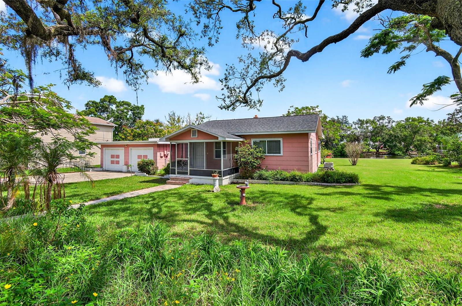 Interior photos available upon request.
Build your dream property! Located on a double lot in the beautiful Historic City of Tarpon Springs this 2,572 square feet under roof is ready to be configured to your dream home. With a massive waterfront backyard, a seawall, and a short distance to the Gulf by boat. Located not far from downtown Tarpon Springs or the world-famous Sponge Docks. Schedule your appointment today to see the property in person. More photos available upon request.