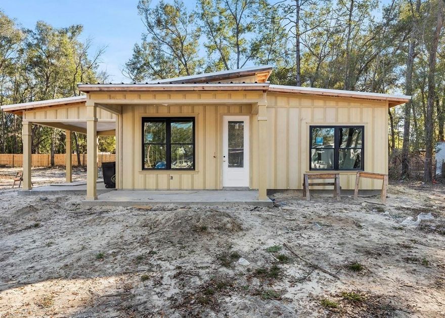 Under Construction. New Construction! Welcome to one of Vision Construction's newest models - The Laredo! This appealing new style features a bright & open floor plan and sits on a generous 1/4 acre lot located 5 minutes from downtown Newberry w/low Gilchrist County taxes. The home features vaulted ceilings in the living room & master suite, a spacious island kitchen, energy efficient appliances & raised panel custom wood cabinets. Enjoy indoor/outdoor living in the gorgeous Florida weather on your oversized covered lanai perfect for entertaining and right off of the kitchen for the ultimate convenience. The luxury master suite boasts an inviting bathroom w/double vanities, European style shower & roomy closet. There is no shortage of storage in this home including a sizable laundry area for all of your organizational needs! Home features a 1-car carport!