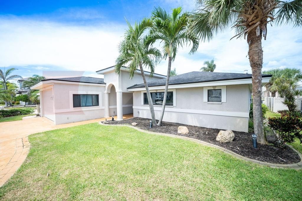 Photo of 166 Bayside Drive, Clearwater Beach, FL 33767 (MLS # TB8423867)