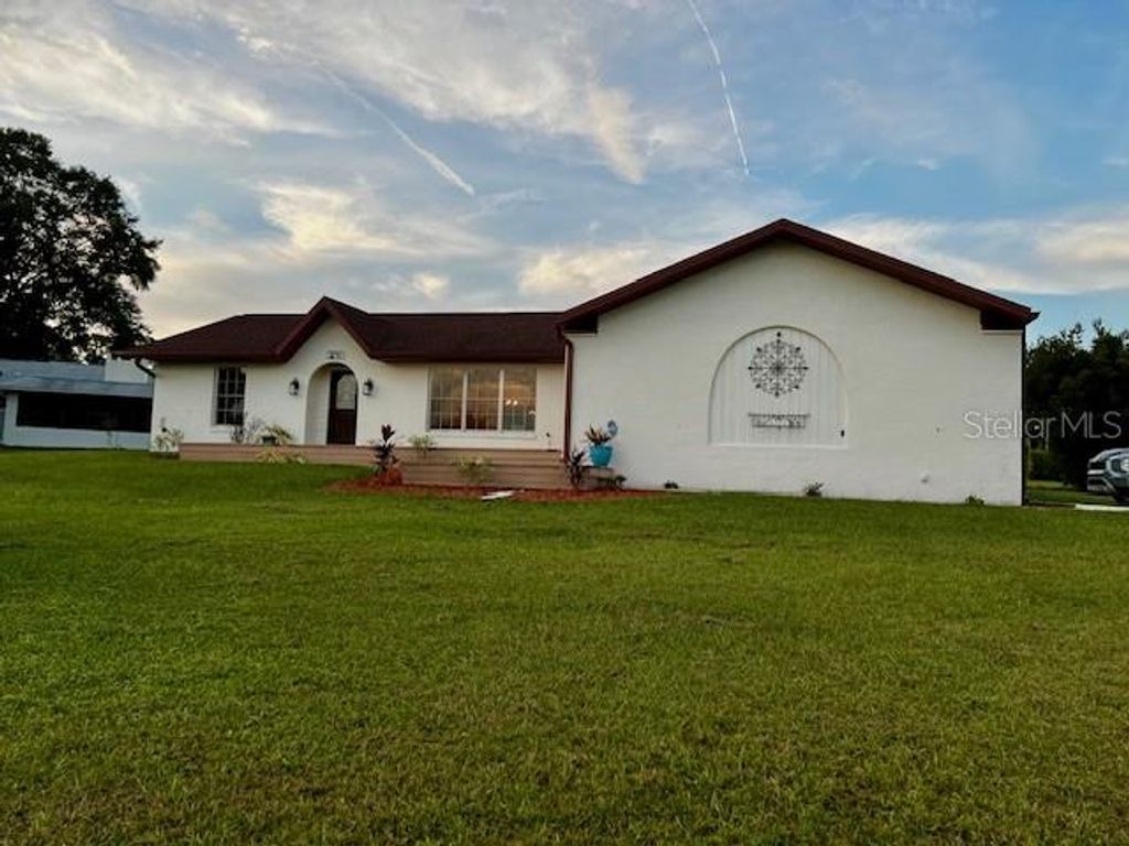 Photo of 8770 SW 196th Terrace Road, Dunnellon, FL 34432 (MLS # OM702652)