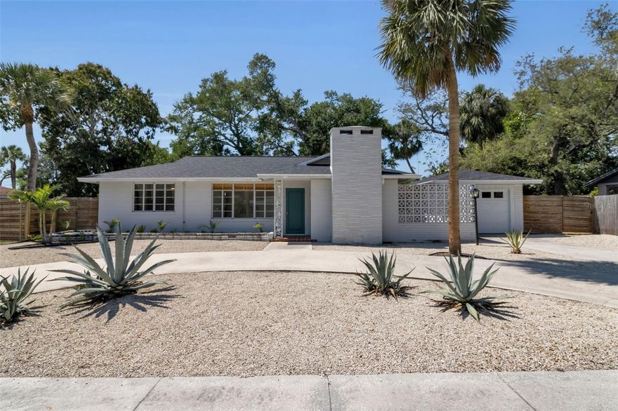 This unique and serene home offers plenty of space to live and entertain comfortably and is in a sought-after West of the Trail neighborhood just two miles north of downtown Sarasota. Multiple living/family rooms provide an array of design options. The split layout affords privacy with two beds and a bath to the left of the front living room, off the back living space to the left is another bedroom and primary suite is to the right. The rear wall of sliding glass doors overlooking the lovely fenced pool/patio/yard allows you to enjoy the always summer Florida lifestyle! Potential exists to divide the home into two separate living units, should this catch your eye as an investment property. There is no shortage of activities nearby, just a short walk through this delightful tree-lined neighborhood will lead you to Indian Beach/Sapphire Shores to watch the incredible sunsets. You will also find several parks within a short distance, including The Bay where you can launch your kayak or partake in free community events. If boating is your thing, you're covered there too, with multiple marinas close by. The famous silky sand of Siesta Key Beach is less than a 20-minute drive, and SRQ airport is just 10 minutes away. The many amazing shops, theaters and restaurants downtown will keep your social calendar booked. Don't let this gem pass you by.