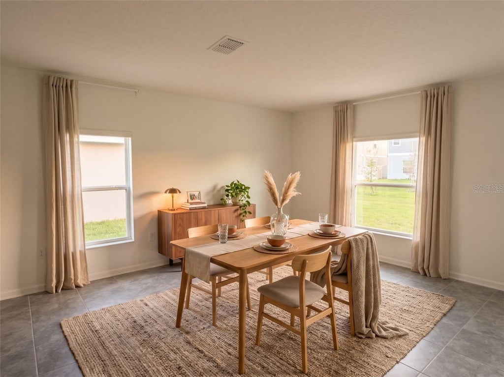 Photo of 2166 Aquifer Lane, Davenport, FL 33837 (MLS # O6451448)