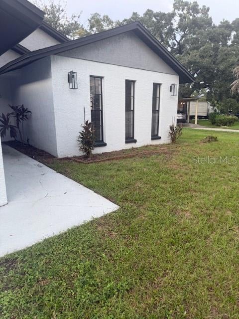 Photo of 225 Ronnie Circle, Orlando, FL 32811 (MLS # O6450364)