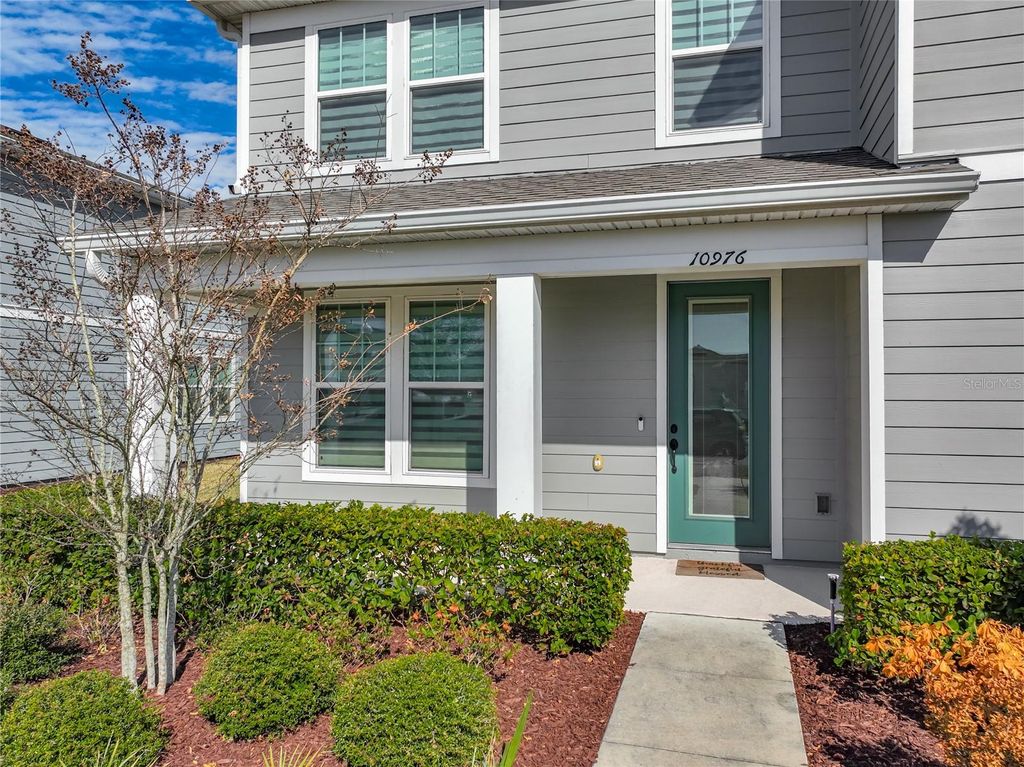 Photo of 10976 Leafshore Loop, Orlando, FL 32829 (MLS # O6381459)