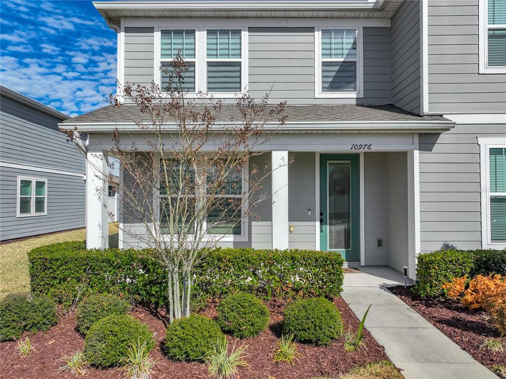 Photo of 10976 Leafshore Loop, Orlando, FL 32829 (MLS # O6381459)