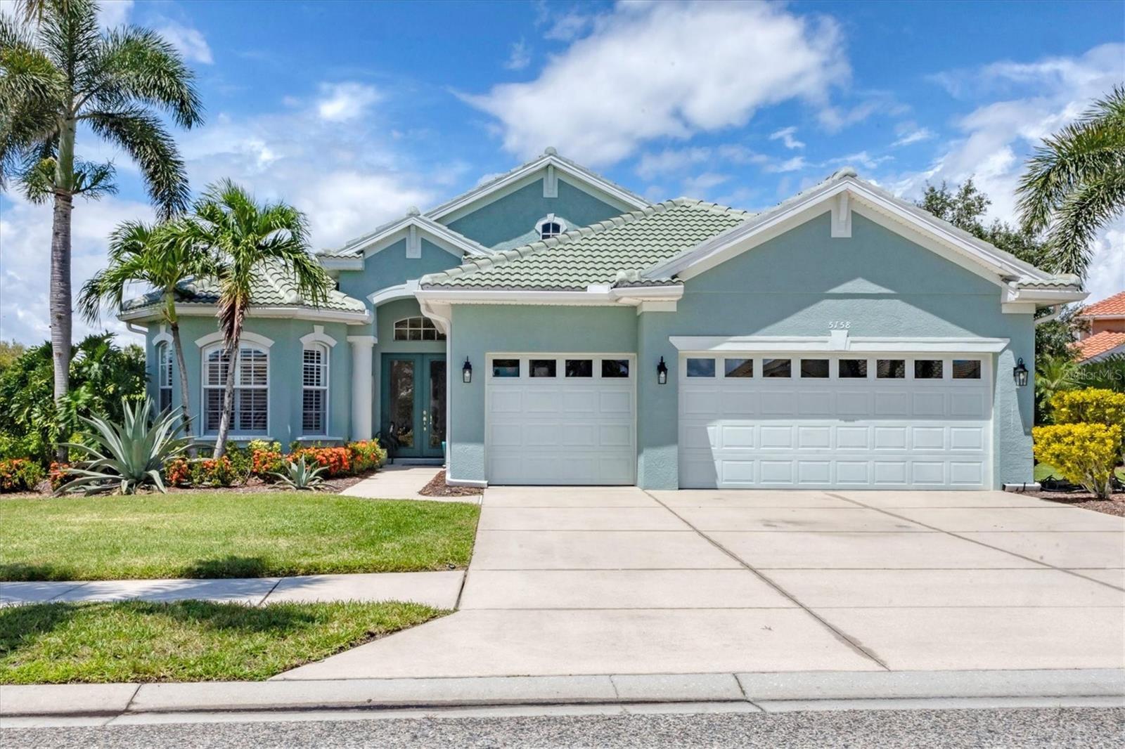 **HERON CREEK GOLF & COUNTRY CLUB **EXECUTIVE SERIES HOME 3 Bed + Den | 2.5 Baths | 3-Car Garage | Just Under 2,600 Sq Ft New Roof! Sweet as its name, Honey Bee Haven is a casually elegant retreat tucked away on a very private preserve homesite in the heart of Heron Creek Golf & Country Club. Here, every day feels like a gentle exhale — a perfect respite after savoring all the pleasures Florida’s paradise has to offer. From the moment you step into the grand round foyer, crowned with an elevated ceiling, your eyes are drawn across the open great room to the sparkling pool and lush preserve beyond. Cascading glass sliding doors frame the view and invite the outdoors in, filling the home with Florida sunshine. Sunlight filters through plantation shutters adorning most windows, highlighting classic crown molding, double tray ceilings, and timeless architectural detail. A Primary Suite Made for Daydreams: The owner’s retreat, painted in serene sky blue, offers a sun-kissed sitting area with direct lanai and pool access. Dual walk-in closets ensure ample storage, while the spa-inspired ensuite pampers with a garden tub, separate shower, dual vanities, and private water closet. Space for Everyone: The two-bedroom guest suite, tucked privately at the front of the home, makes visitors feel right at home. A spacious den—ideal for a home office or easily converted to a fourth bedroom—enjoys the convenience of an adjacent half bath. For hosting holidays or special occasions, the formal dining room offers an elegant space for memorable gatherings. The Heart of the Home: The chef’s kitchen connects seamlessly to the great room, keeping the cook at the center of the action. Rich cherry wood cabinetry, tumbled tile backsplash, and classic solid surface countertops blend beauty and function, while the NATURAL GAS range will delight the culinary enthusiast. The sunny breakfast nook overlooks the lanai and pool, making every meal a scenic occasion. Outdoor Living at Its Sweetest: Step outside to a screened lanai and sparkling pool framed by lush tropical landscaping and the untouched beauty of the conservation preserve. This private haven is perfect for quiet mornings with coffee, sunny afternoons in the pool, or evening gatherings under the stars. For the Collector, Hobbyist, or Adventurer: The 3-car garage offers room for all your toys — whether that’s golf carts, kayaks, A VINTAGE HOT ROD ? beach gear, or a workshop space. Life at Honey Bee Haven isn’t just about the home — it’s about the lifestyle. As a resident of Heron Creek Golf & Country Club, you’ll enjoy exceptional amenities including a 21,000 sq ft clubhouse, 27 holes of Championship golf Arthur Hills design, resort style pool & spa, a robust social activity calendar, fitness center, Tennis courts & formal & casual dining options! Club Membership is required w/ 3 membership levels offered beginning at $278/month *NO CDD FEES * LOW HOA FEES include lawn care, trimming, mulching, irrigation, FIBER OPTIC/ TV/ HIGH-SPEED INTERNET & Gated entry, conveniently located w/easy access to I-75 & US-41, Cocoa Plum Shopping ,Myakkahatchee Creek trails, WELLEN PARK, Braves Stadium, COSTCO & will be less than 3 miles to the new 450 Million SMH Hospital Coming to I-75 & Sumter Blvd! FLOOD ZONE X (lenders won't require flood insurance)and.... As if calling Honey Bee Haven home couldn't get any sweeter many of the furnishing will be available under separate contract making her MOVE-IN READY !