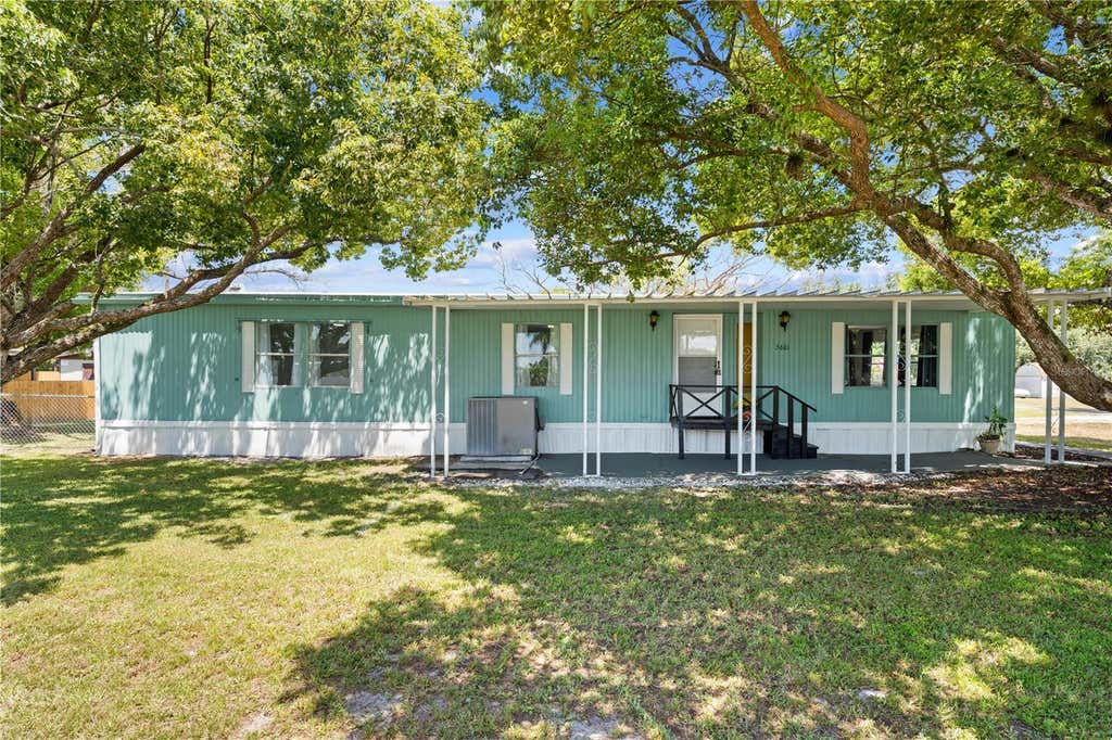 Photo of 5601 Lake Lizzie Drive, Saint Cloud, FL 34771 (MLS # S5155733)
