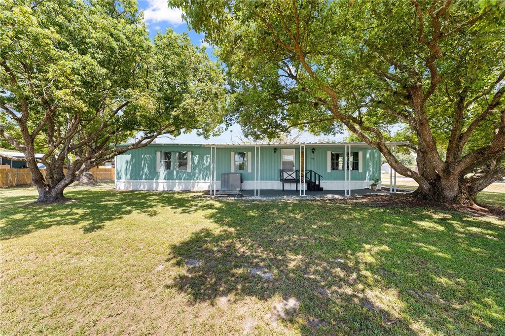 Photo of 5601 Lake Lizzie Drive, Saint Cloud, FL 34771 (MLS # S5155733)