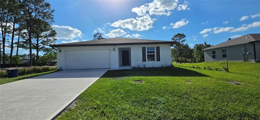 Short Sale. Short Sale.  This is not a bank approved price.  Gently loved 2024 built home with an added outdoor kitchen, consisting of grill, refrigerator and countertops.  This spectacular home has been barely lived in on a quiet street.  Close to I-95, shopping, beaches and Orlando.  The split bedroom layout has a lovely primary with a large walk-in closet, dual sinks and plenty of room for linens.  All appliances come with the property.