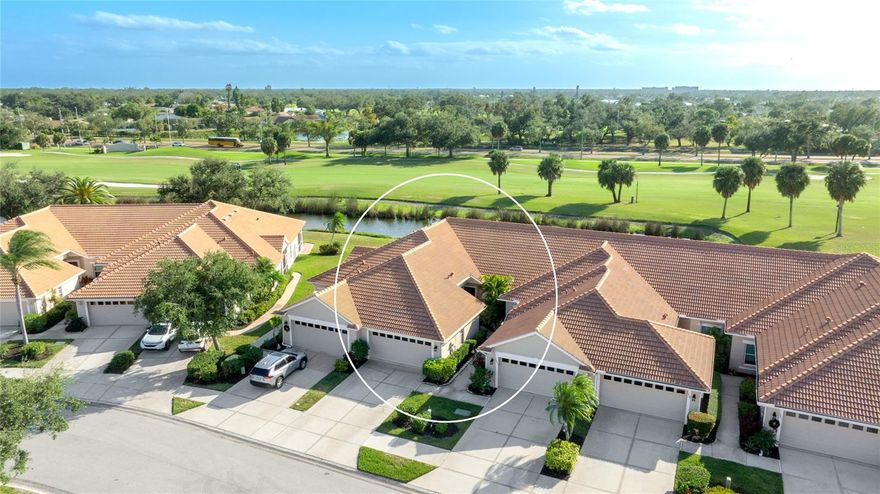 This beautifully maintained 2 bedroom, 2 bathroom villa with a 2-car garage is located within Venice’s premier Pelican Pointe Golf and Country Club, offering serene water and golf course views overlooking the 12th hole and a true maintenance-free lifestyle. Inside, the home features a bright, open layout with high ceilings, abundant natural light, and updated flooring throughout the main living areas. The spacious living and dining areas flow seamlessly to the screened lanai through sliding glass doors, creating an effortless indoor-outdoor connection ideal for relaxing or entertaining while enjoying tranquil pond and fairway views. The kitchen offers crisp cabinetry, ample counter space, and a breakfast bar perfect for casual dining. The primary suite provides a private retreat with lanai access, generous closet space, and a beautifully updated en-suite bath featuring a walk-in shower. Guest accommodations are thoughtfully arranged for comfort and privacy. Offered furnished, the home allows for an easy, turnkey transition. Pelican Pointe Golf and Country Club delivers an exceptional resort-style lifestyle with amenities including a clubhouse with restaurant, bar, and grill for fine dining or casual lunches, ballroom, fitness center, tennis and pickleball courts, sidewalks throughout the community, and a wide variety of social activities. Residents enjoy access to an Olympic-sized heated pool, a private pool at The Links, 27 holes of championship golf, and a full-service pro shop. A very active Women’s Association with over 40 groups and activities enhances the vibrant community atmosphere. Social membership is included in the low HOA fee, and golf membership is optional. Maintenance-free living includes lawn care, roof maintenance, pest control, basic cable, and internet. Conveniently located just a short drive from Venice’s beautiful beaches, shopping and dining on Olde Venice Avenue, Sarasota, and Punta Gorda Airport, this home offers the ideal blend of comfort, convenience, and Florida lifestyle living.