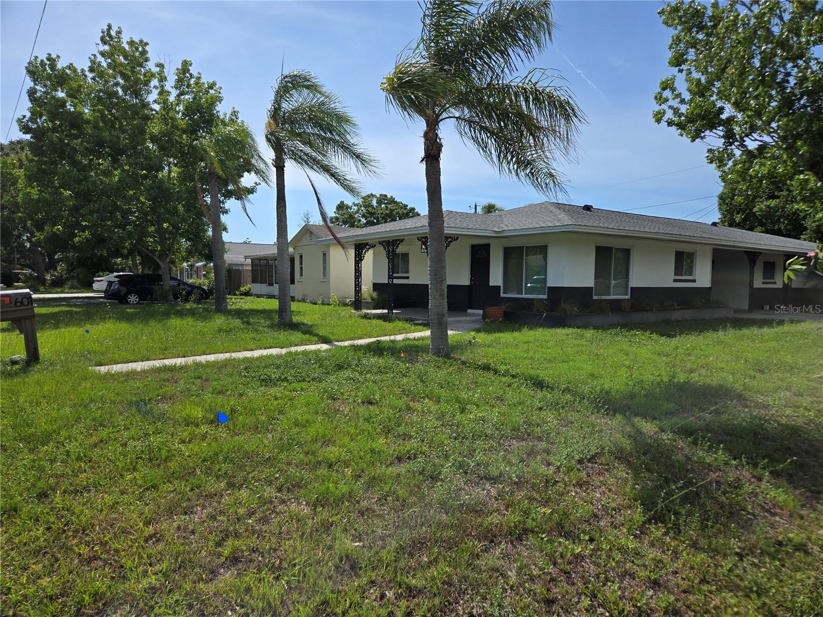 Gulfport at it's best! Not in flood zone (zone D)...less than a mile from main strip. Located in quiet, well-maintained neighborhood! Unit features freshly redone terrazzo floors... Kitchen recently updated with quartz countertops! Dedicated parking with one carport space and stacked driveway parking in addition to ample street parking. Private laundry with washer/dryer! Literally checks all the boxes! Hurry...won't last!