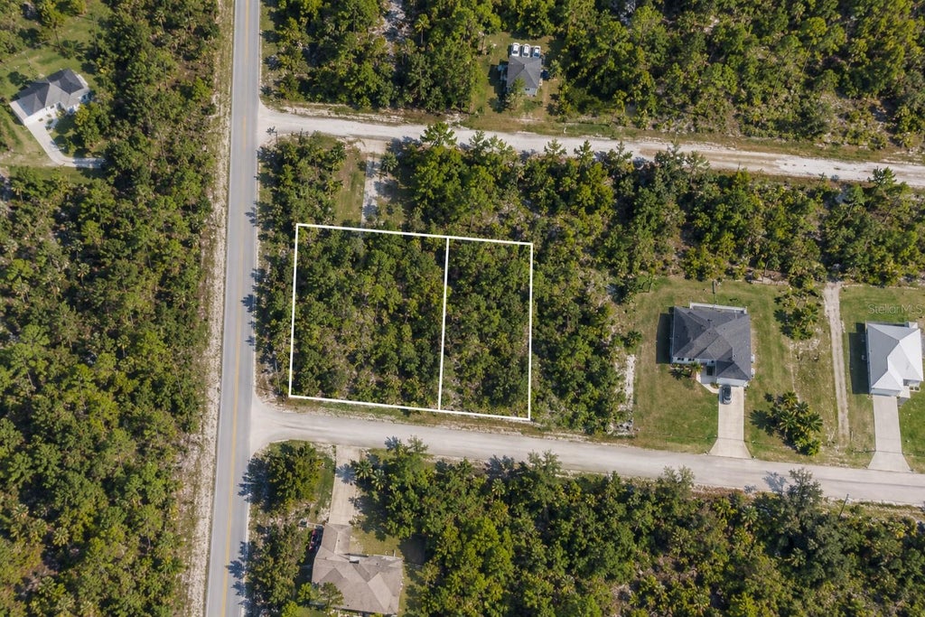 Photo of 27030 Sumatra Drive, Punta Gorda, FL 33955 (MLS # K4903927)