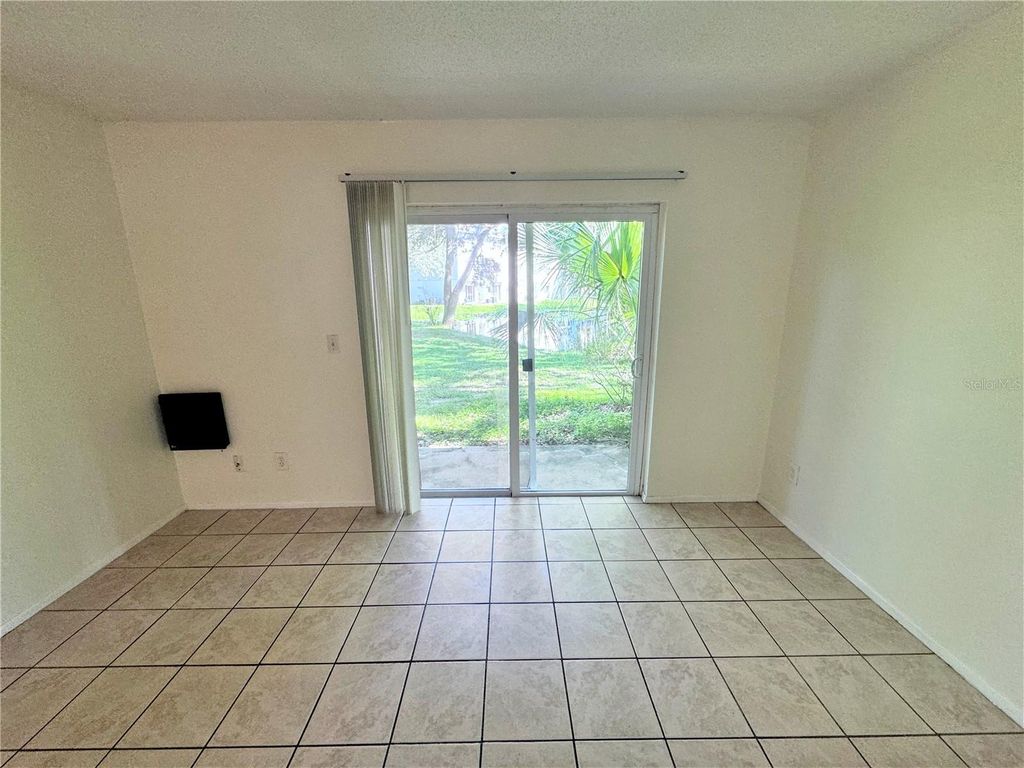 Photo of 7177 E Bank Drive #102, Tampa, FL 33617 (MLS # O6366915)