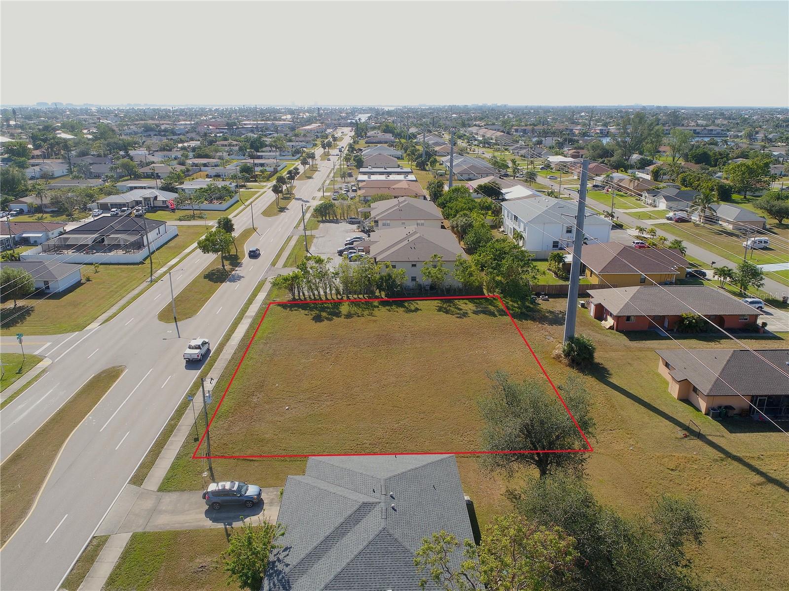 Terrific opportunity to acquire a fully cleared double lot in a prime south Cape Coral location on Santa Barbara Blvd. Enjoy Florida coastal living at its best with fishing, boating and kayaking plus gulf beaches, fine dining, medical centers, local entertainment and much more right on your doorstep! Cape Coral Pkwy is less than 10 blocks away. This is a 0.46 acre vacant lot, with water, sewer and irrigation installed. No eagles, owls or turtles on site. Zoned residential multi family providing flexibility for 1 or 2 single family homes or various types of multi family (duplex, quadplex, six-unit etc). RML zoning allows for up to 16 units per acre- verify with City of Cape Coral and see Municode link below. Photo lot lines approximate. Boundary & protected species surveys available.